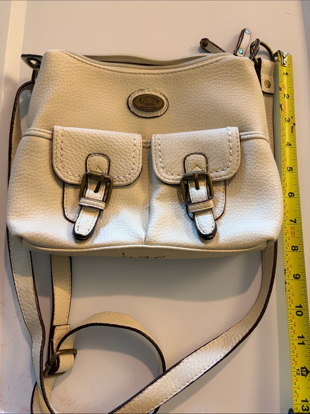 b.o.c. Cream Pebbled Leather Crossbody with Front Buckle Pockets